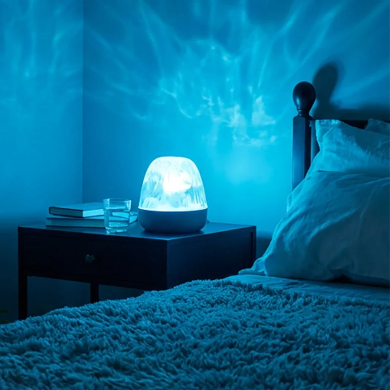 Lampada a LED a 16 colori con effetto increspatura dell'acqua e telecomando. - Image 2