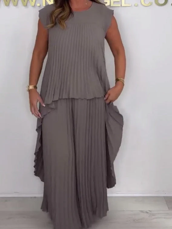 Completo composto da top midi irregolare a maniche corte plissettato e pantaloni a gamba larga con elastico in vita di Laney - Image 6